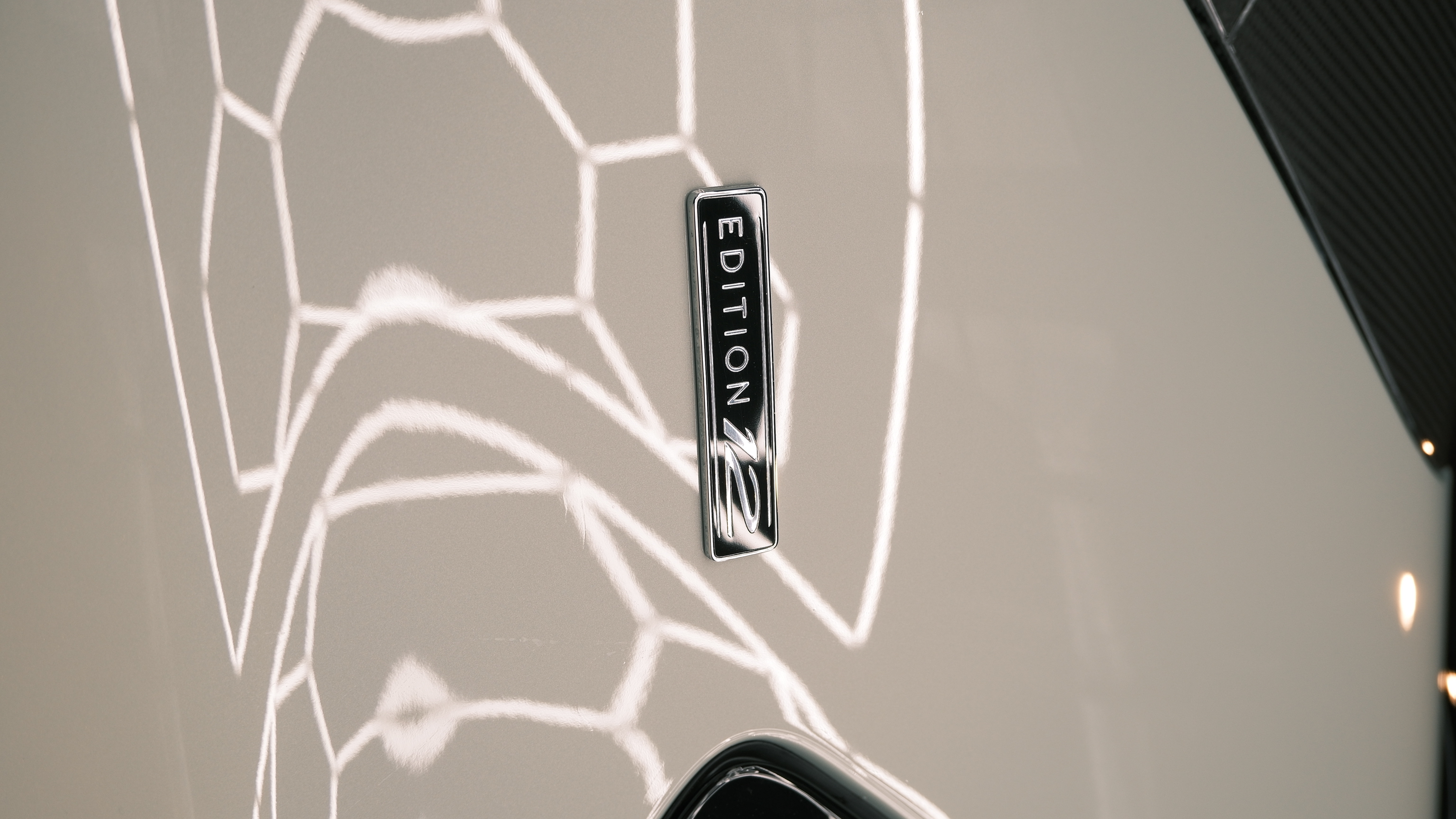 Bentley Bentayga Edition 12 badge with polished paint reflections