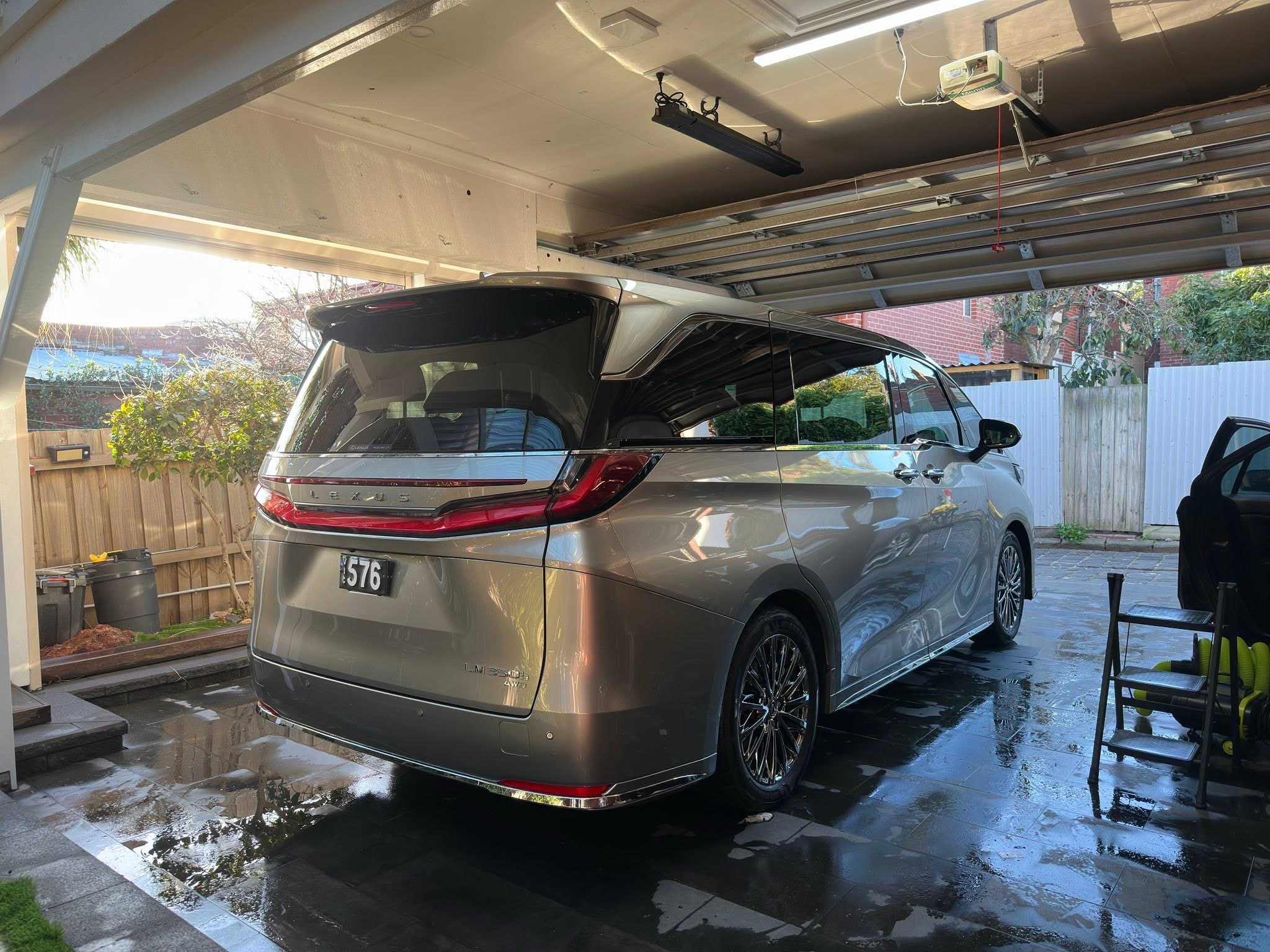 Lexus LM350h rear exterior — Heritage Plate 576