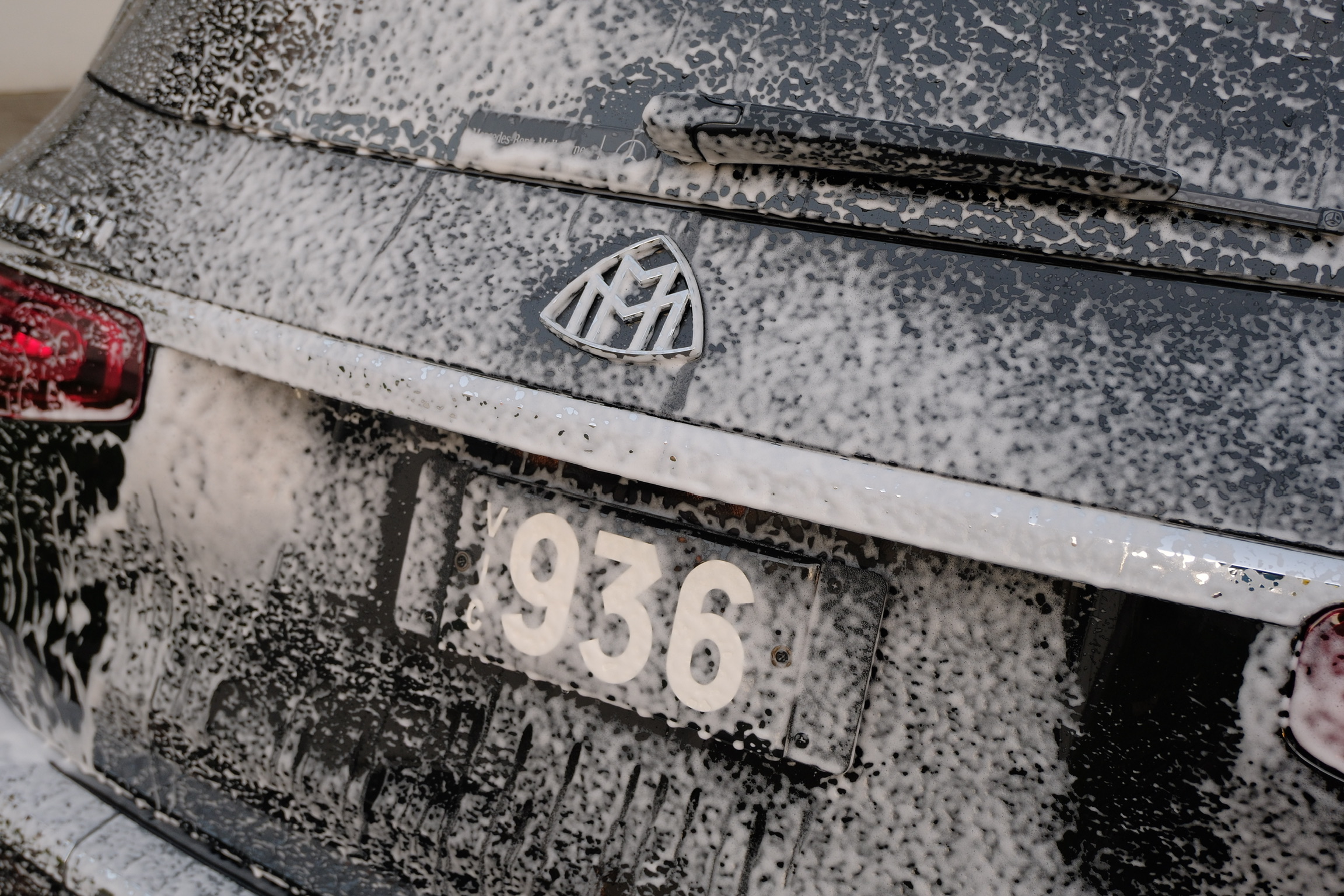 Mercedes-Maybach GLS600 rear emblem during foam wash — Heritage Plate 936