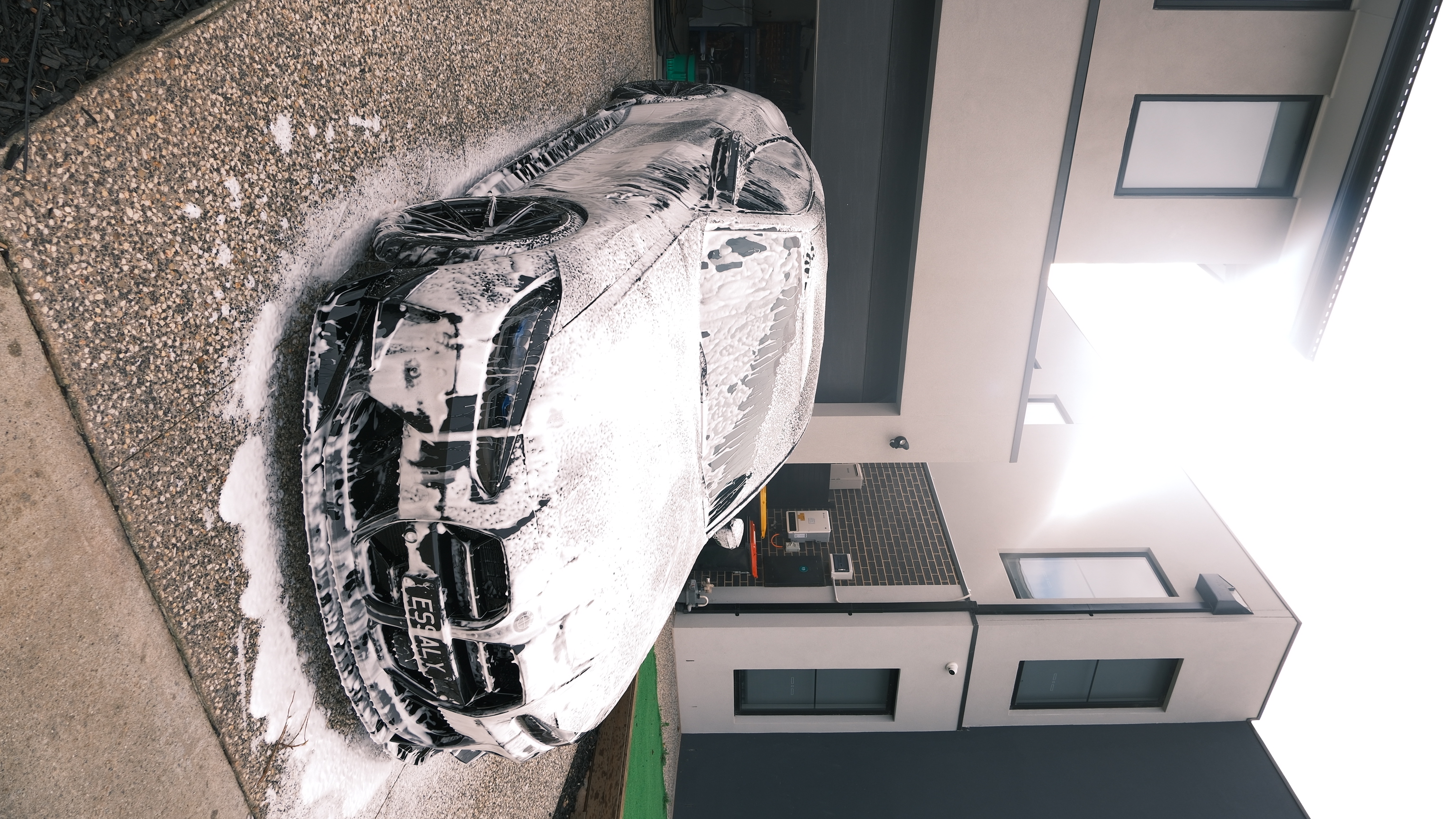 BMW M4 coupe foam pre-wash front view